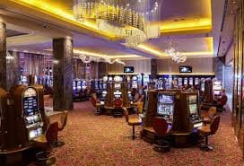 Mesin slot online dengan tema neon hijau dan hitam di rakyatslot